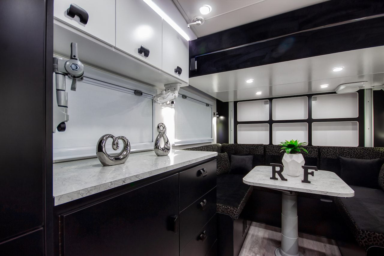 Royal Flair Aussiemate luxury caravan, featuring a cozy kitchen, ample natural light, and smart storage