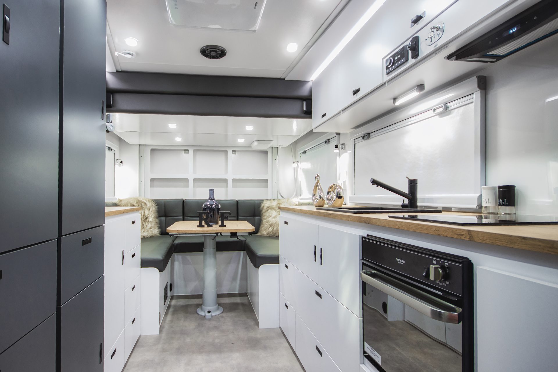 Royal Flair Aussiemate caravan with cozy kitchen seating, natural light, and integrated storage